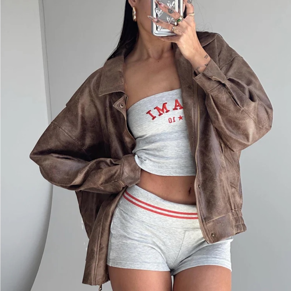 Brown lioness bomber